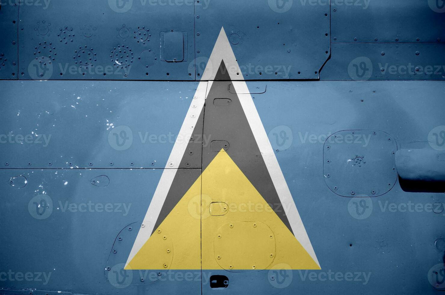 Saint Lucia flag depicted on side part of military armored helicopter closeup. Army forces aircraft conceptual background photo