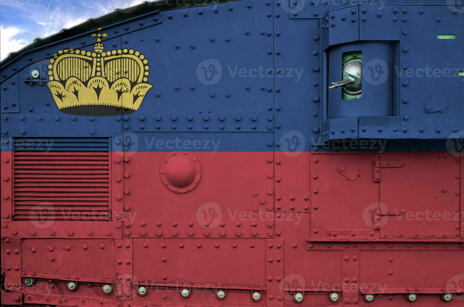 Liechtenstein flag depicted on side part of military armored tank closeup. Army forces conceptual background photo