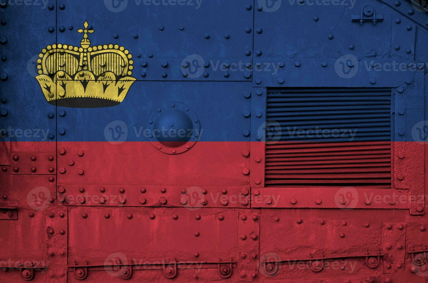 Liechtenstein flag depicted on side part of military armored tank closeup. Army forces conceptual background photo