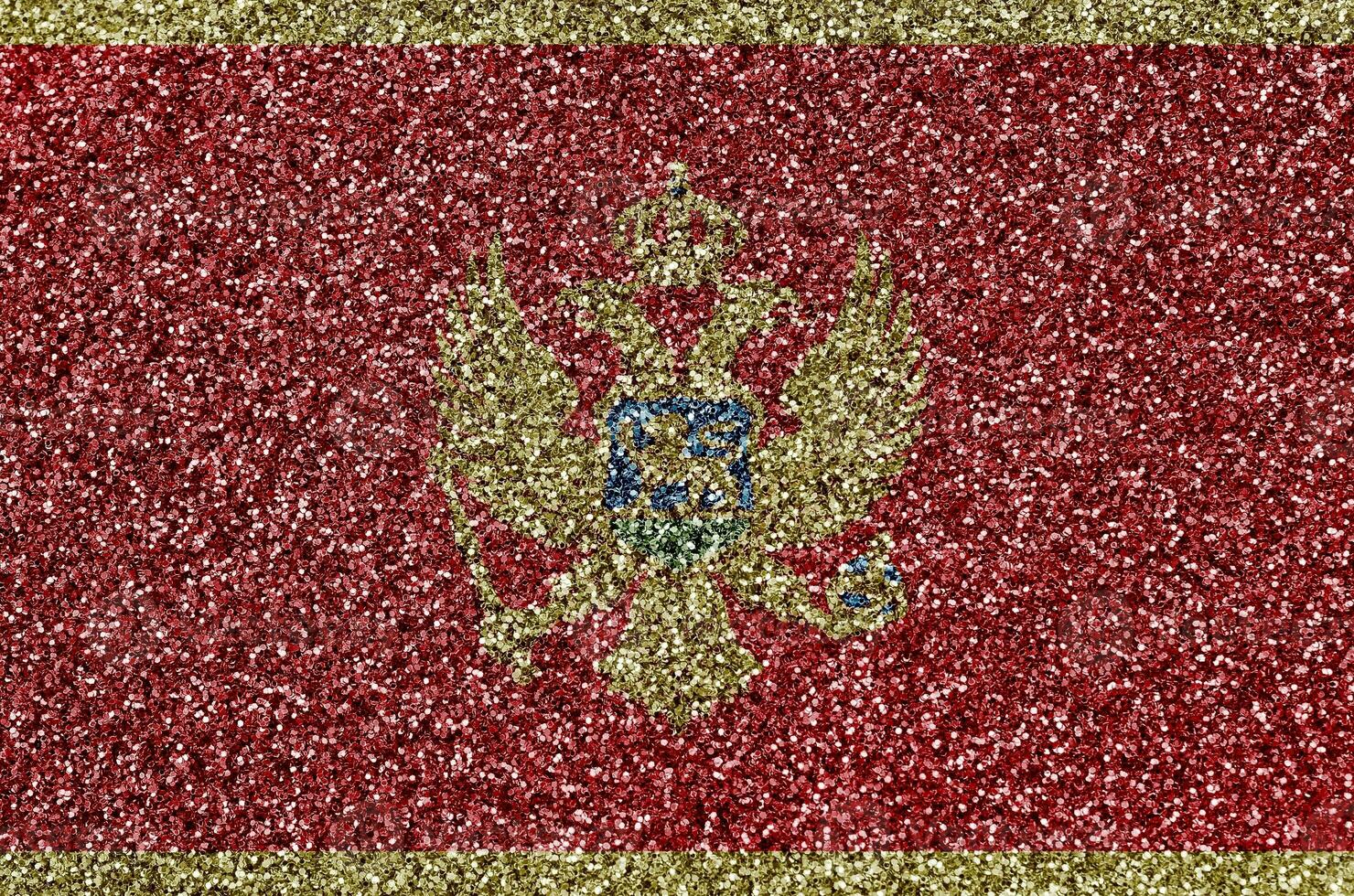 Montenegro flag depicted on many small shiny sequins. Colorful festival background for party photo