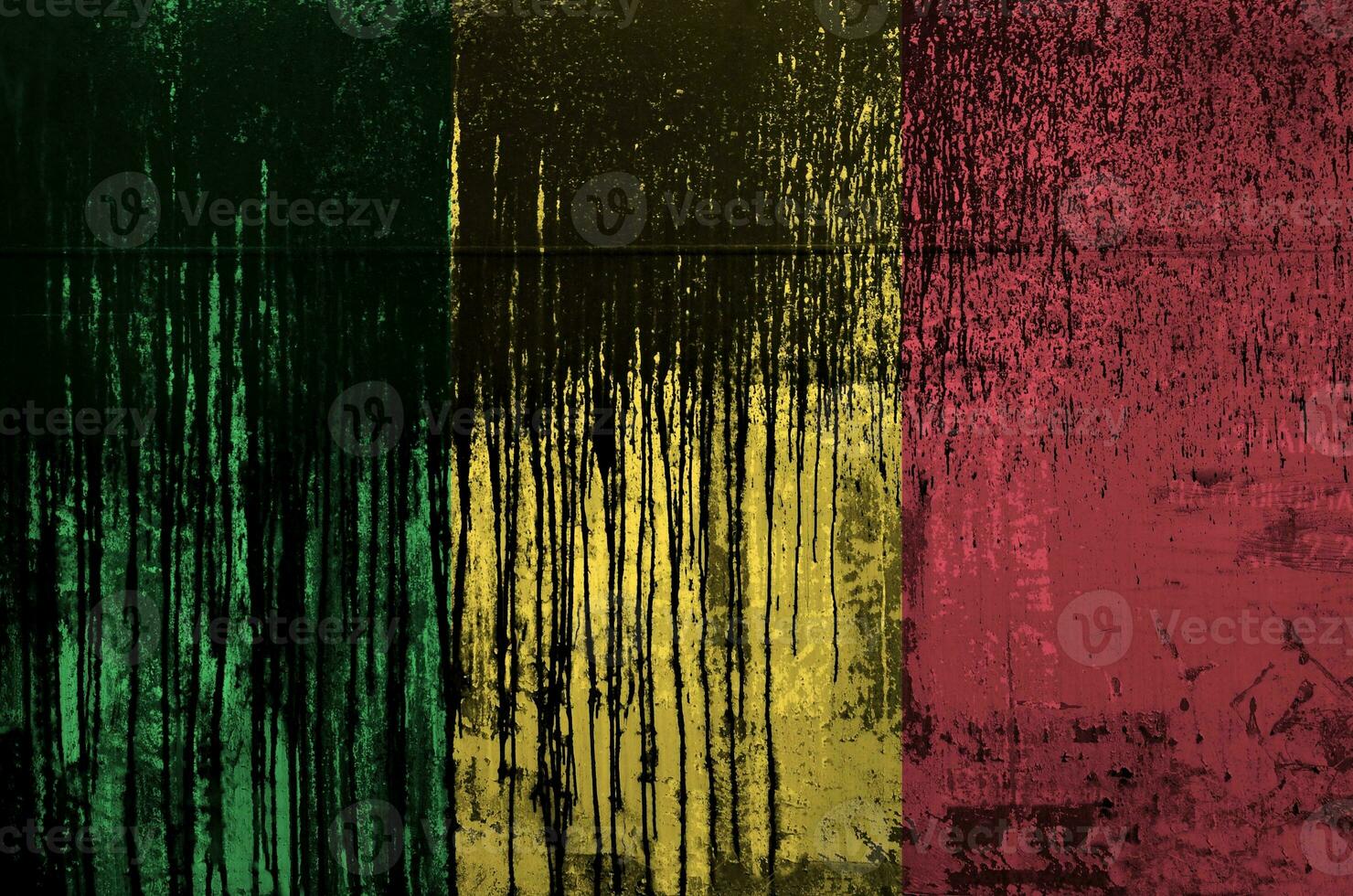 Mali flag depicted in paint colors on old and dirty oil barrel wall closeup. Textured banner on rough background photo