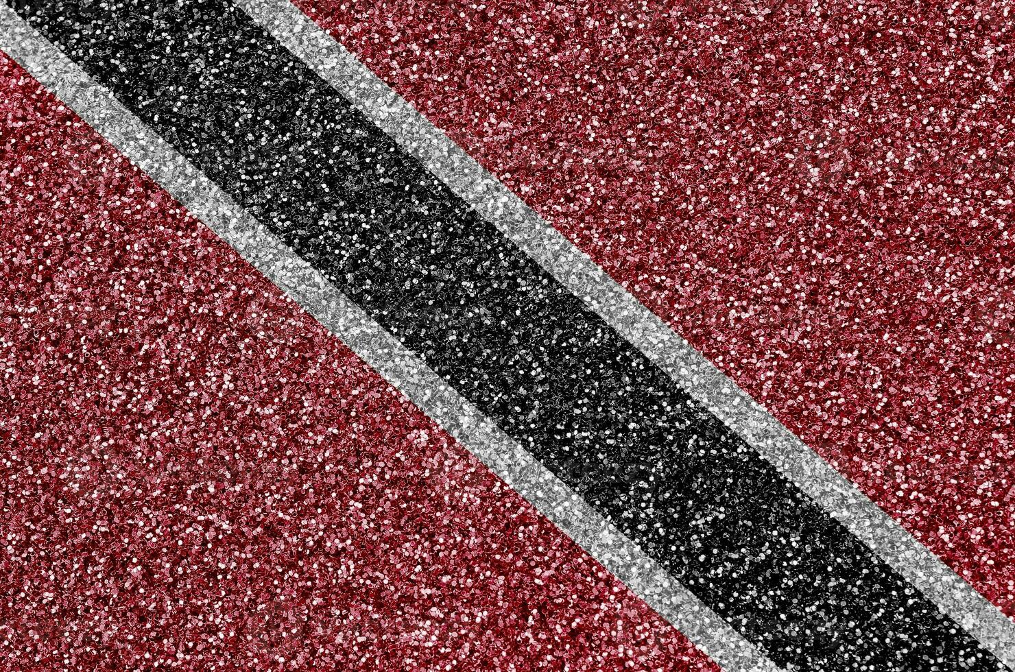 Trinidad and Tobago flag depicted on many small shiny sequins. Colorful festival background for party photo