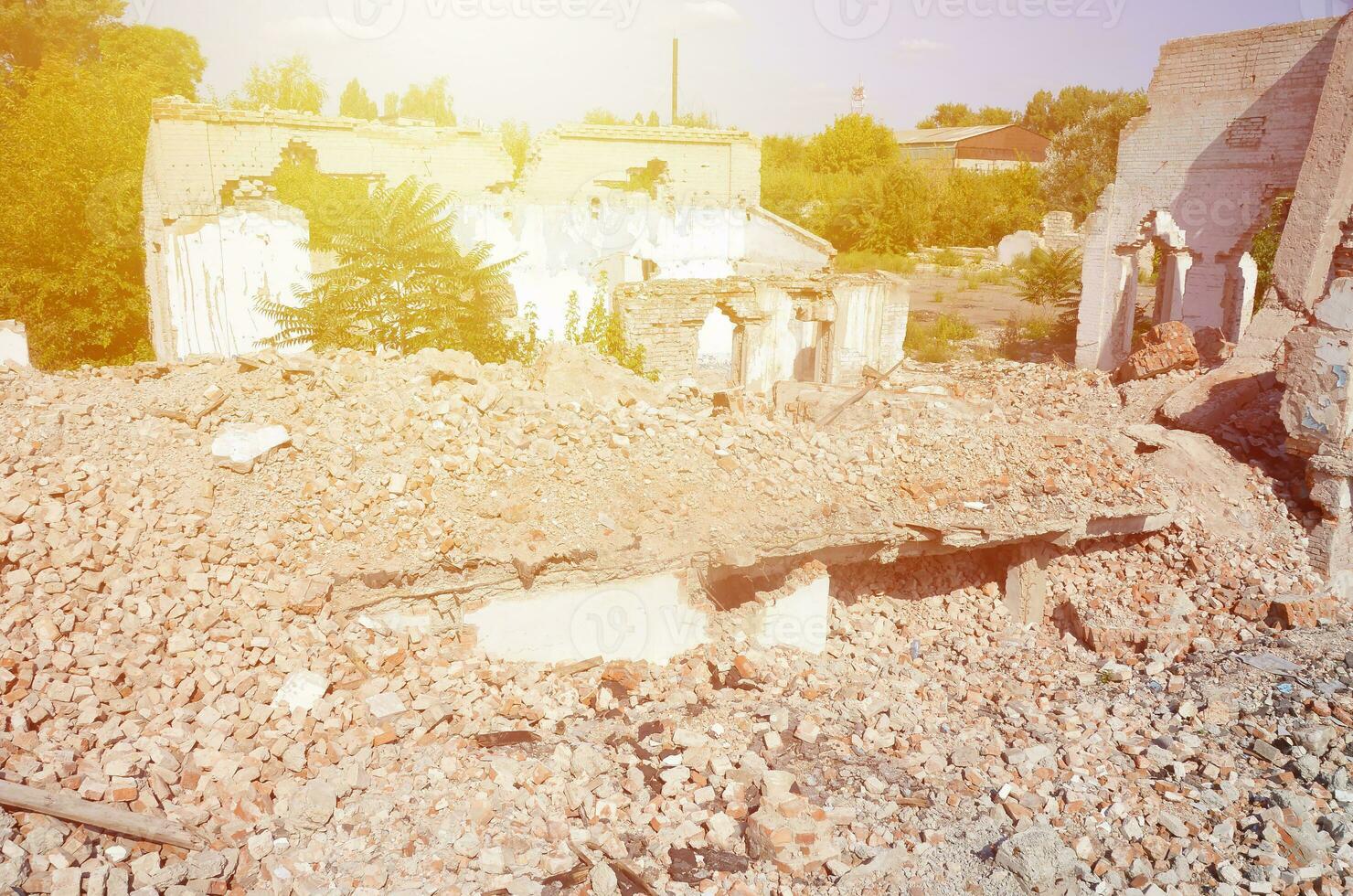 Collapsed industrial multistorey building in daytime photo