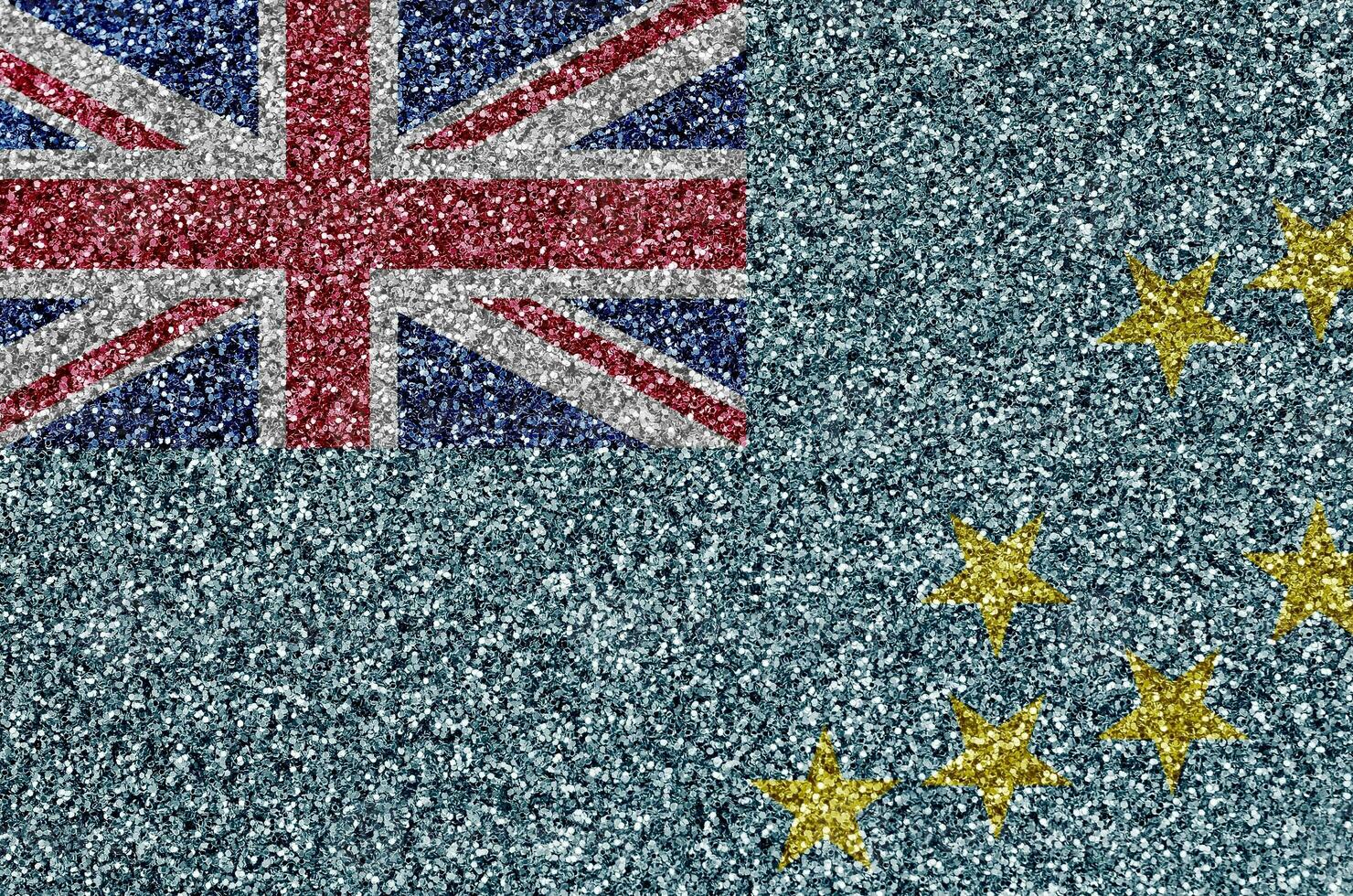 Tuvalu flag depicted on many small shiny sequins. Colorful festival background for party photo