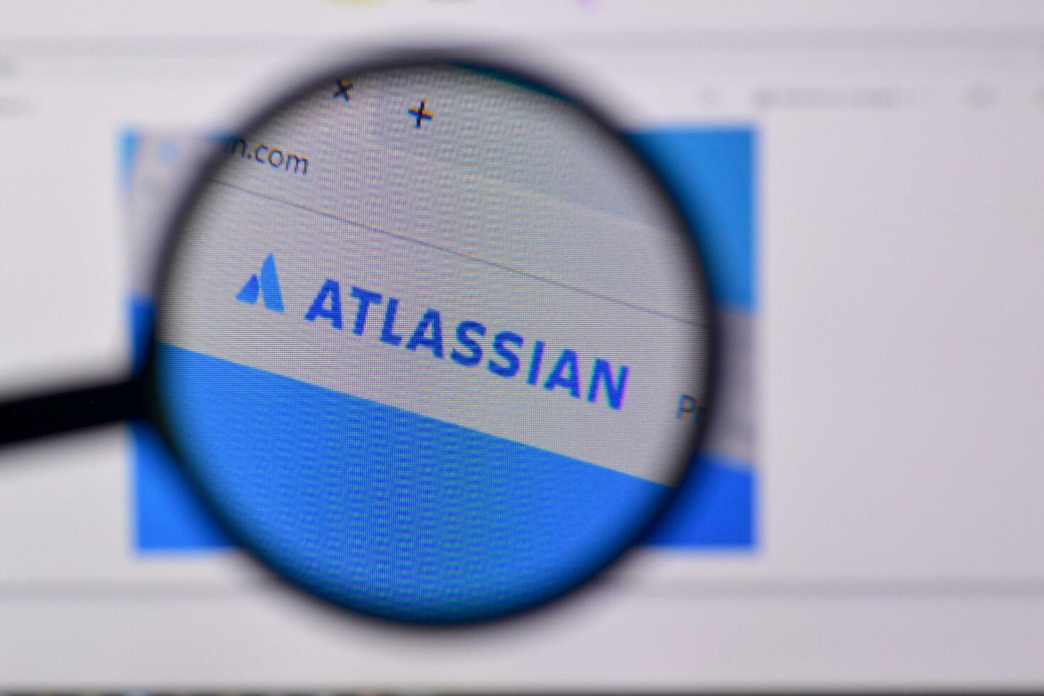 Homepage of atlassian website on the display of PC, url - atlassian.com. photo