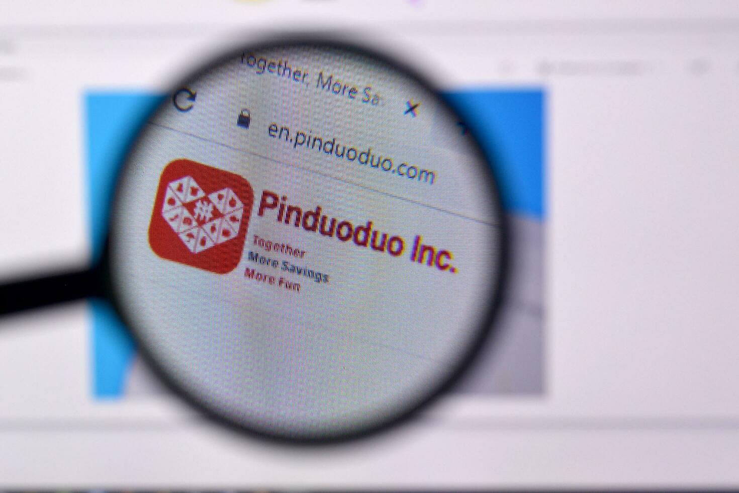 Homepage of pinduoduo website on the display of PC, url - pinduoduo.com. photo