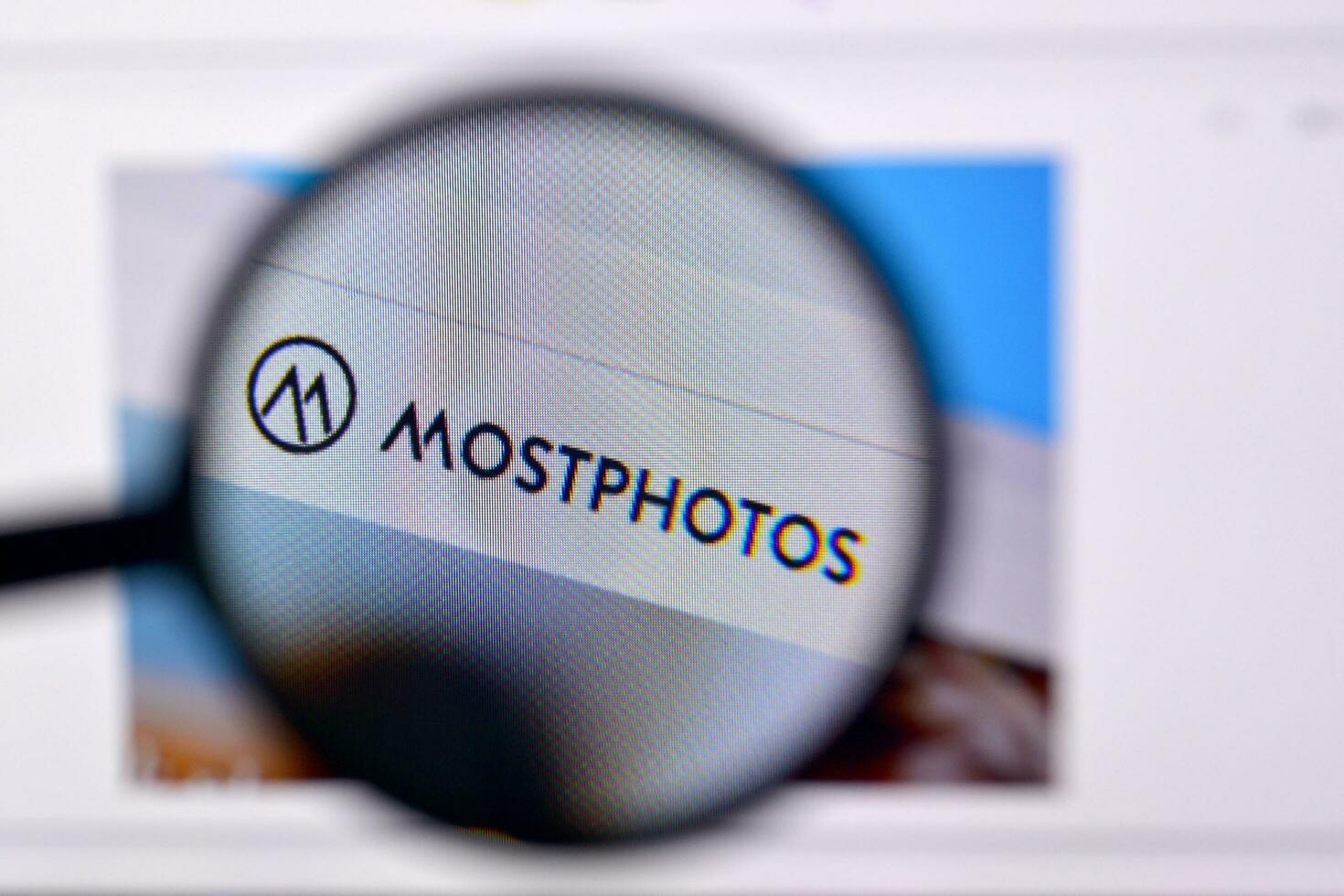 Homepage of mostphotos website on the display of PC, url - mostphotos.com. photo