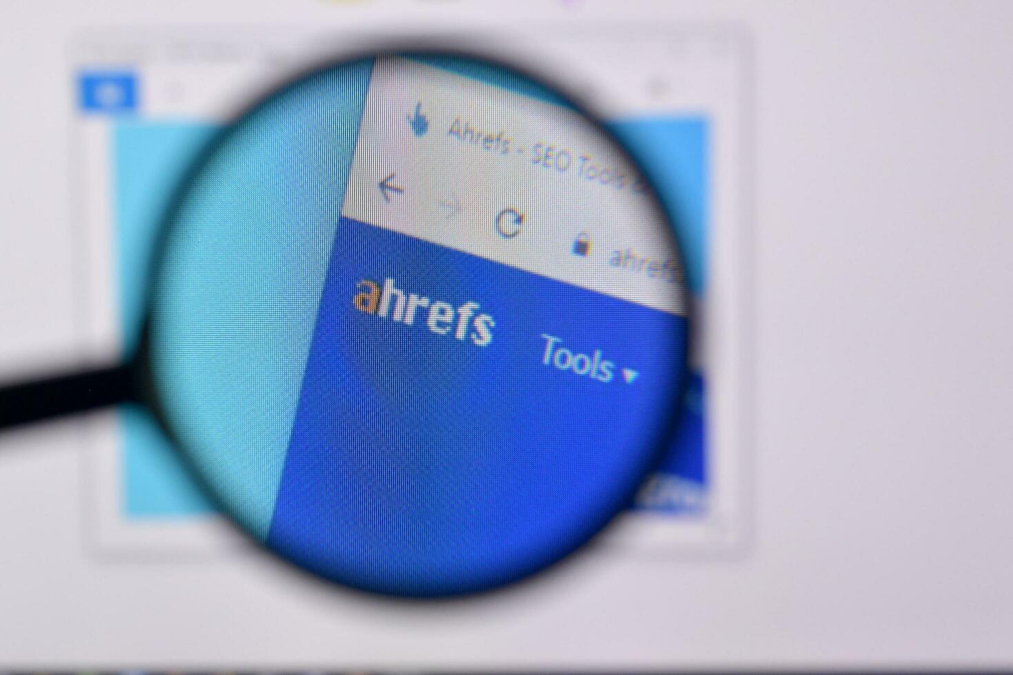 Homepage of ahrefs website on the display of PC, url - ahrefs.com. photo