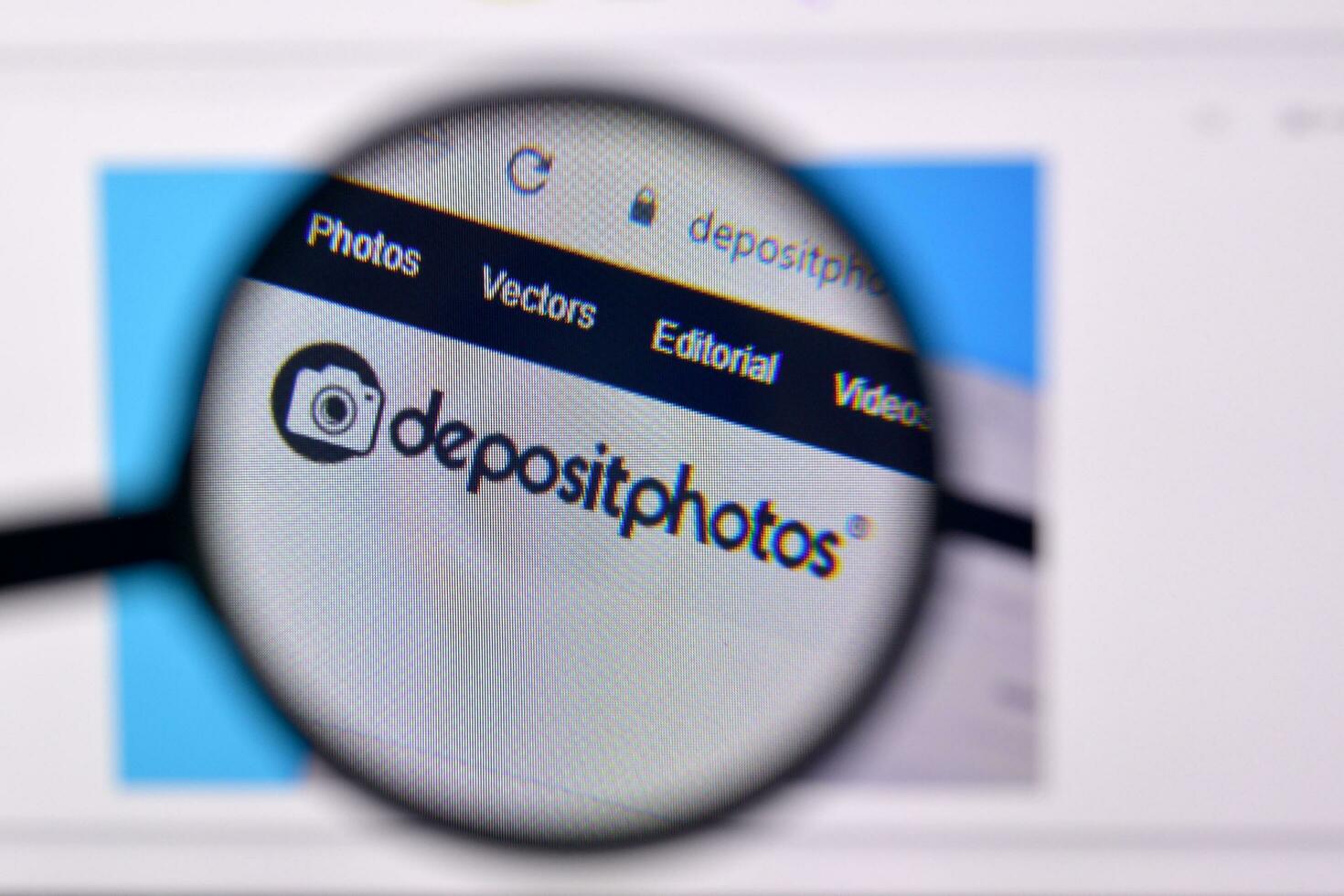 Homepage of depositphotos website on the display of PC, url - depositphotos.com. photo