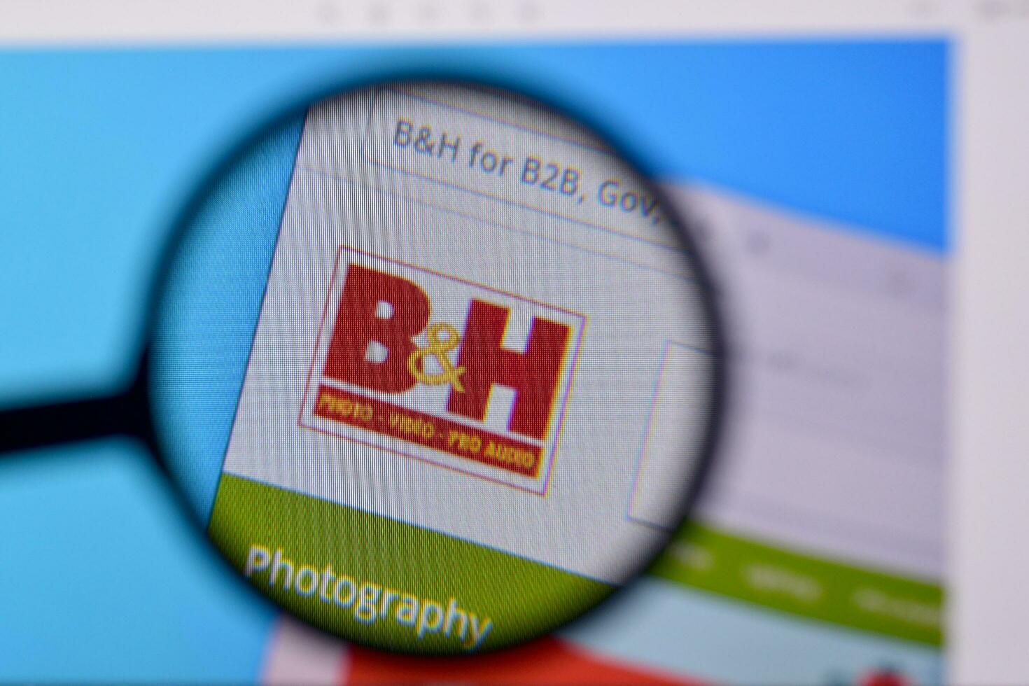 Homepage of B and H website on the display of PC, url - bhphotovideo.com. photo