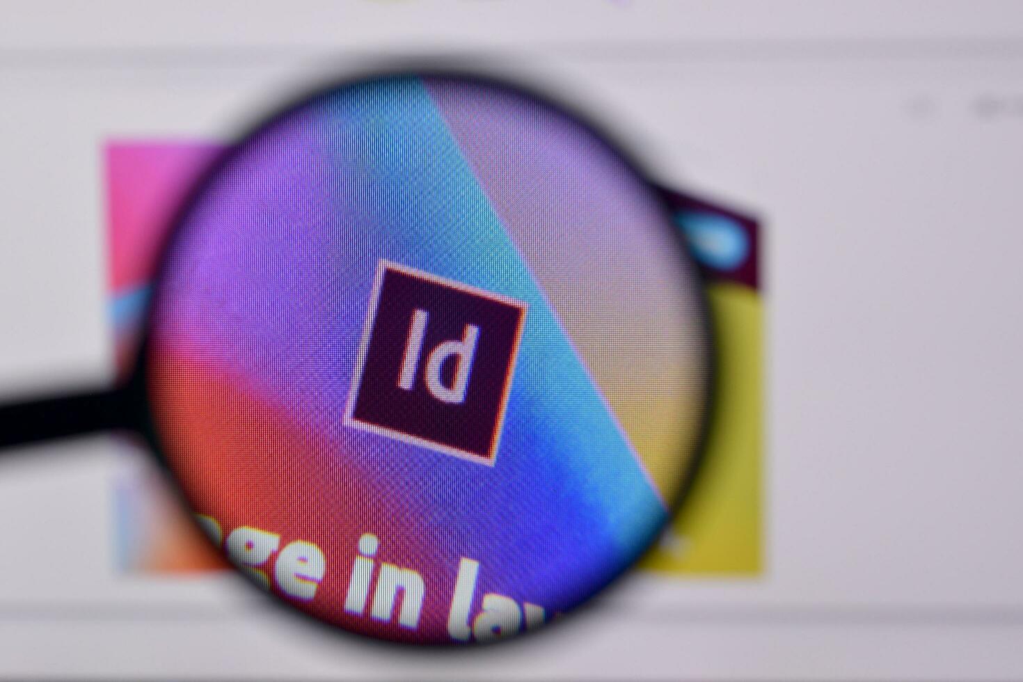 Web page of adobe indesign product on official website on the display of PC photo