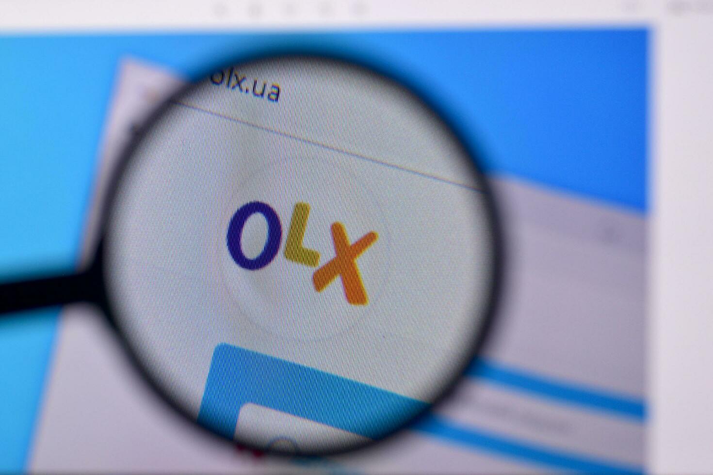Homepage of olx website on the display of PC, url - olx.ua. photo