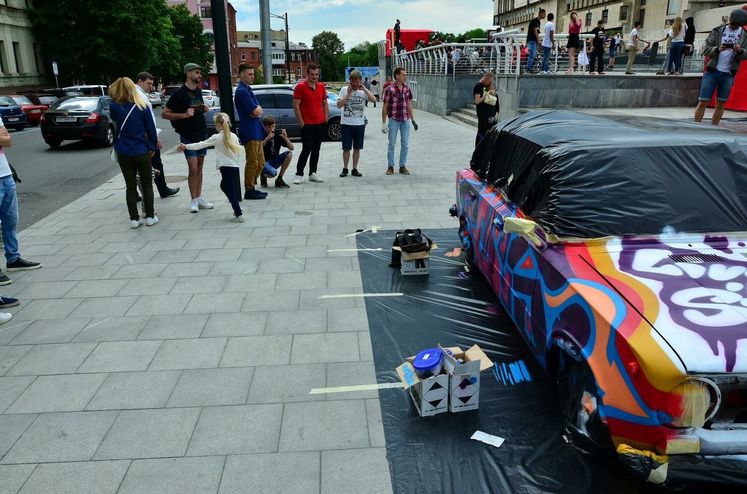 KHARKOV, UKRAINE - MAY 27, 2017 Festival of street art. A car that was painted by masters of street art during the festival. The result of the work of several graffiti artists. Original aerography photo