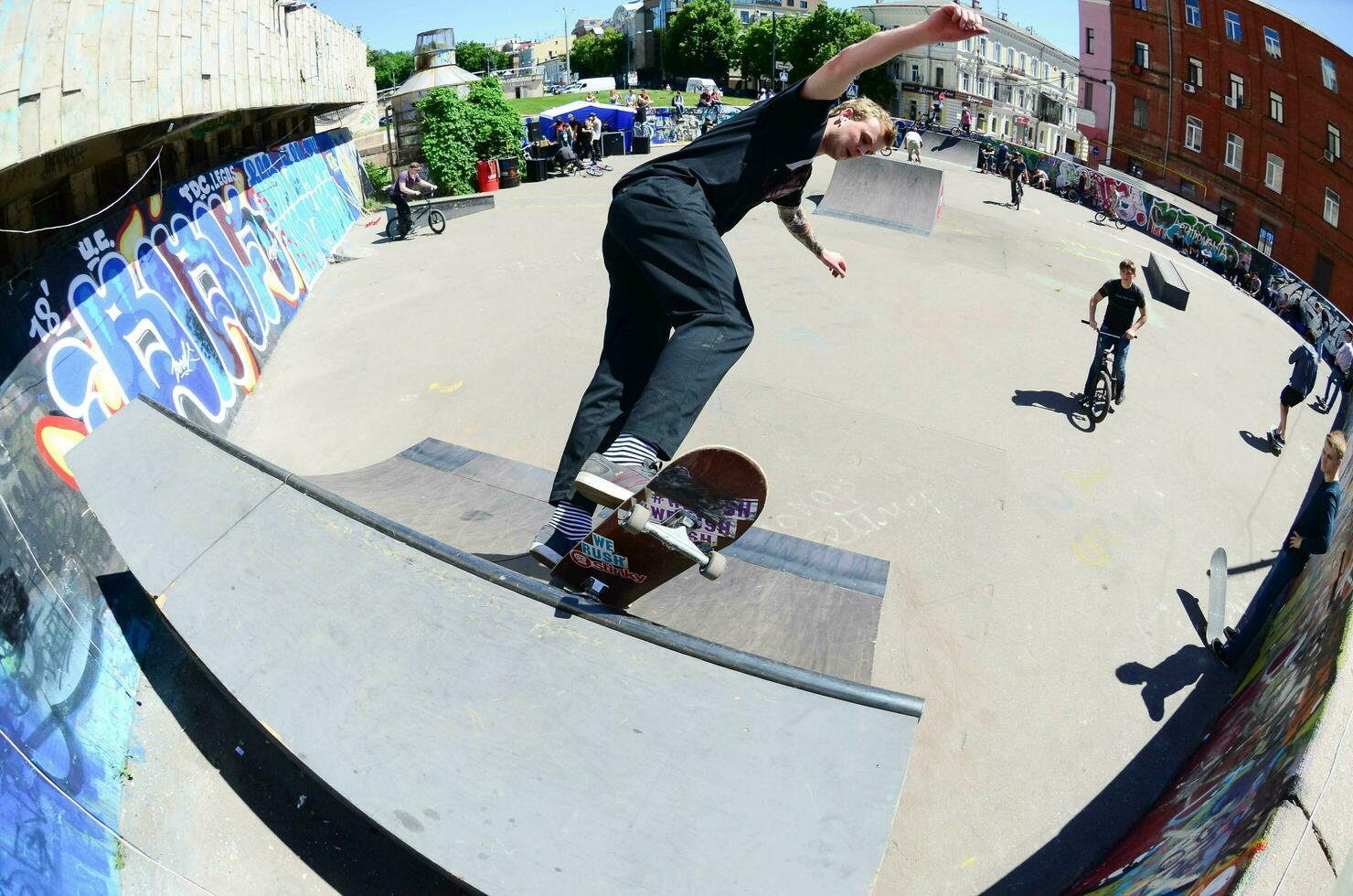 KHARKIV, UKRAINE - 27 MAY, 2018 Skateboarding contest in outdoors skate park during the annual festival of street cultures photo