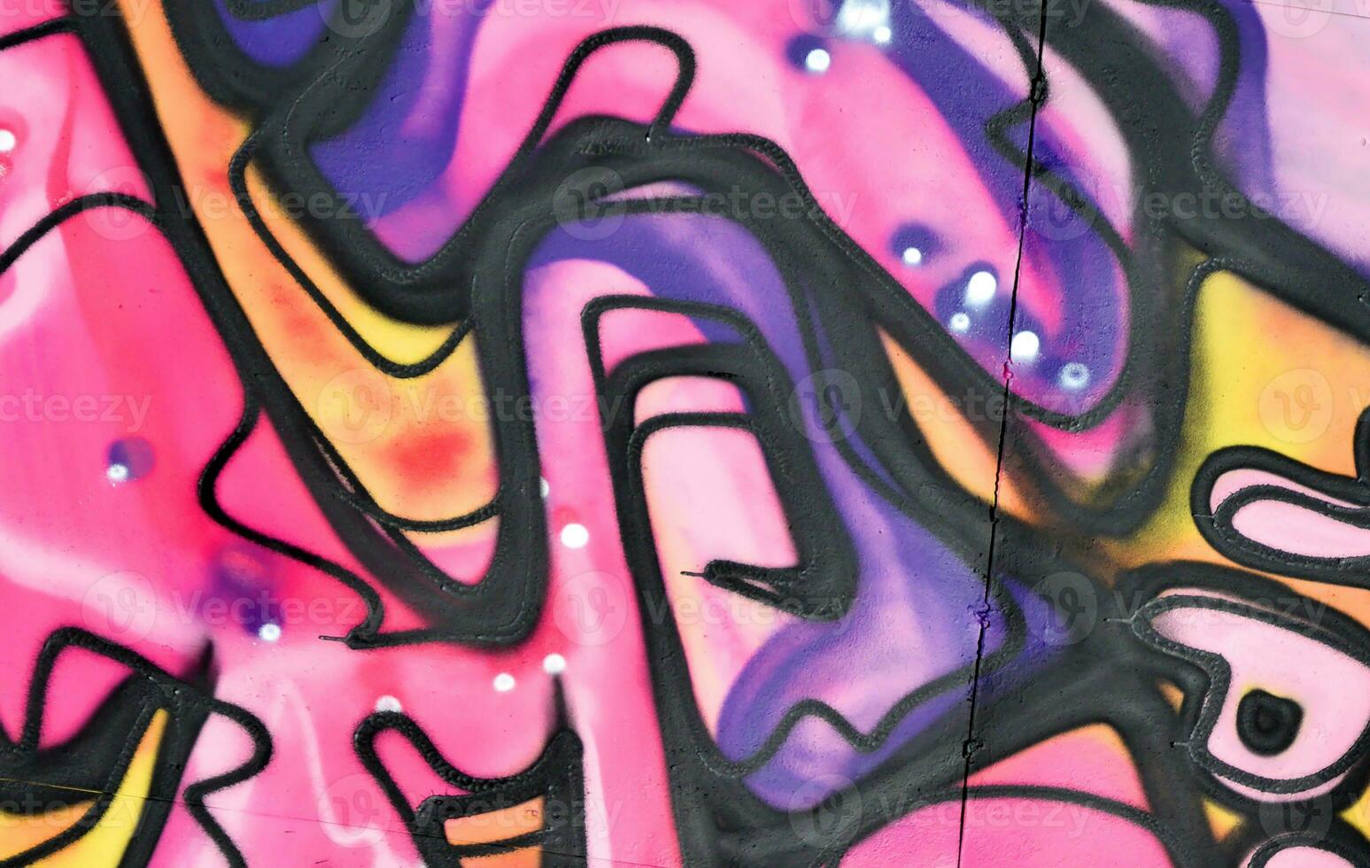 Colorful background of graffiti painting artwork with bright aerosol strips and beautiful colors photo