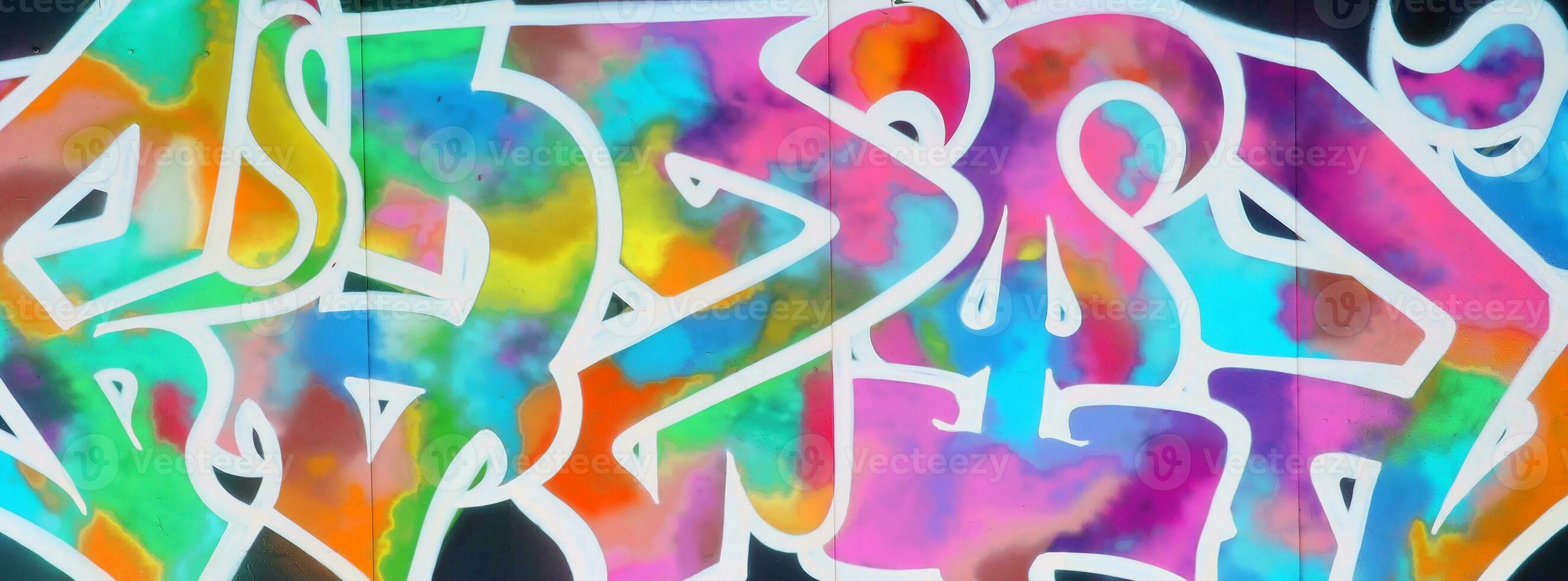 Colorful background of graffiti painting artwork with bright aerosol strips on metal wall photo