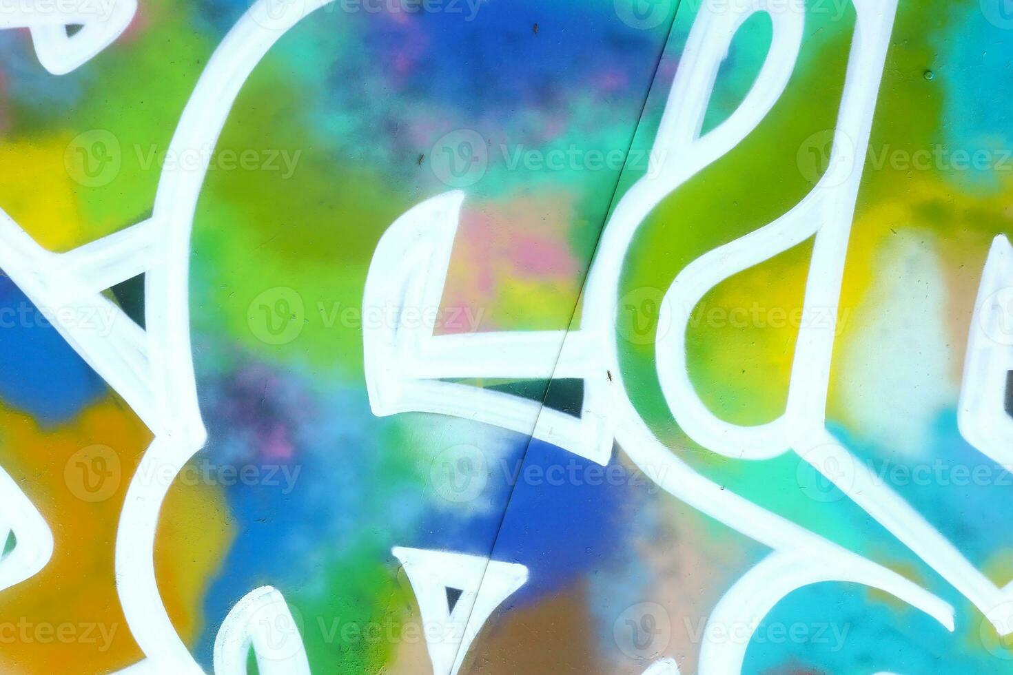 Colorful background of graffiti painting artwork with bright aerosol strips on metal wall photo