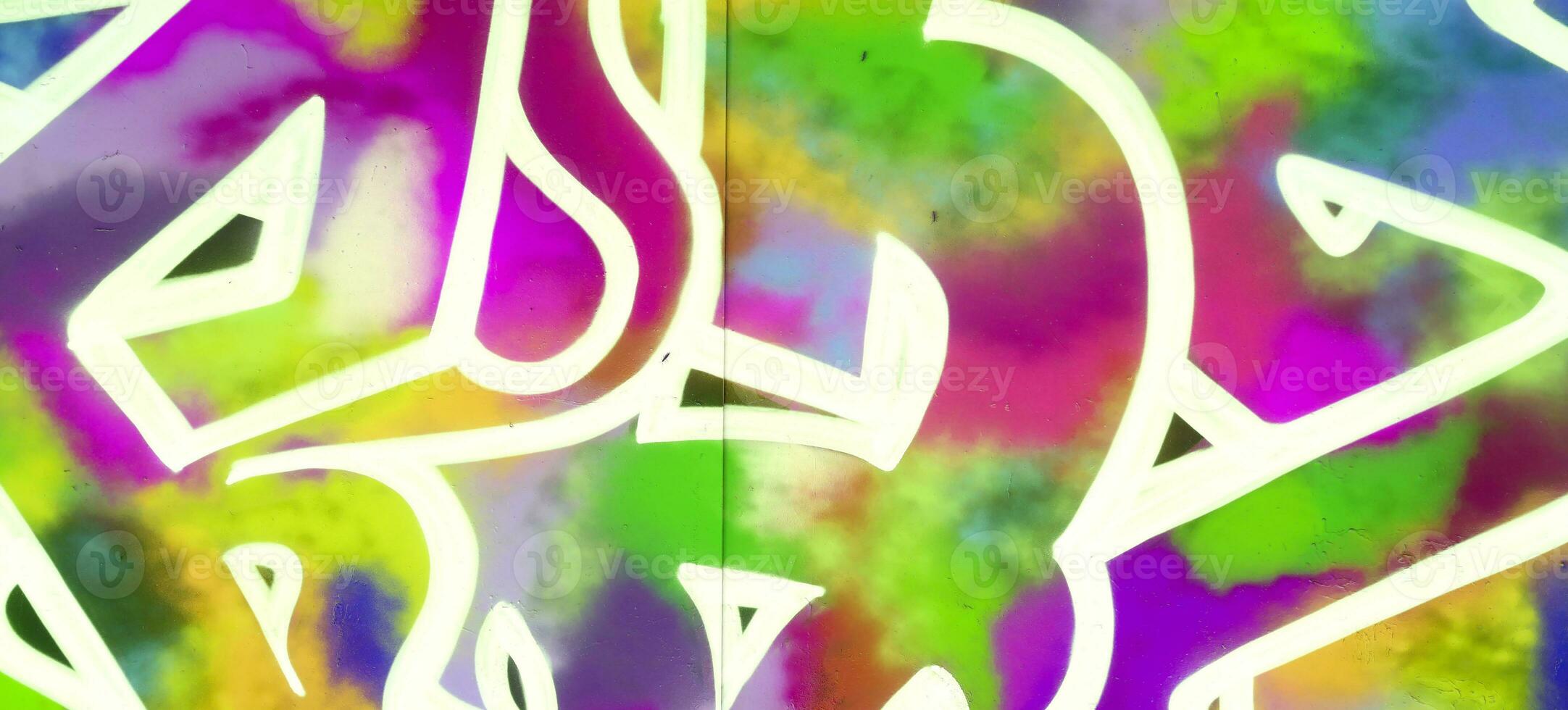 Colorful background of graffiti painting artwork with bright aerosol strips on metal wall photo
