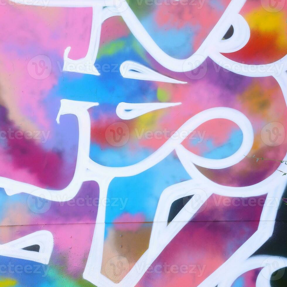 Colorful background of graffiti painting artwork with bright aerosol strips on metal wall photo