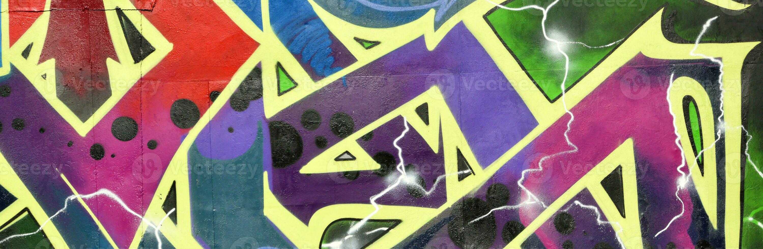 Colorful background of graffiti painting artwork with bright aerosol strips on metal wall photo