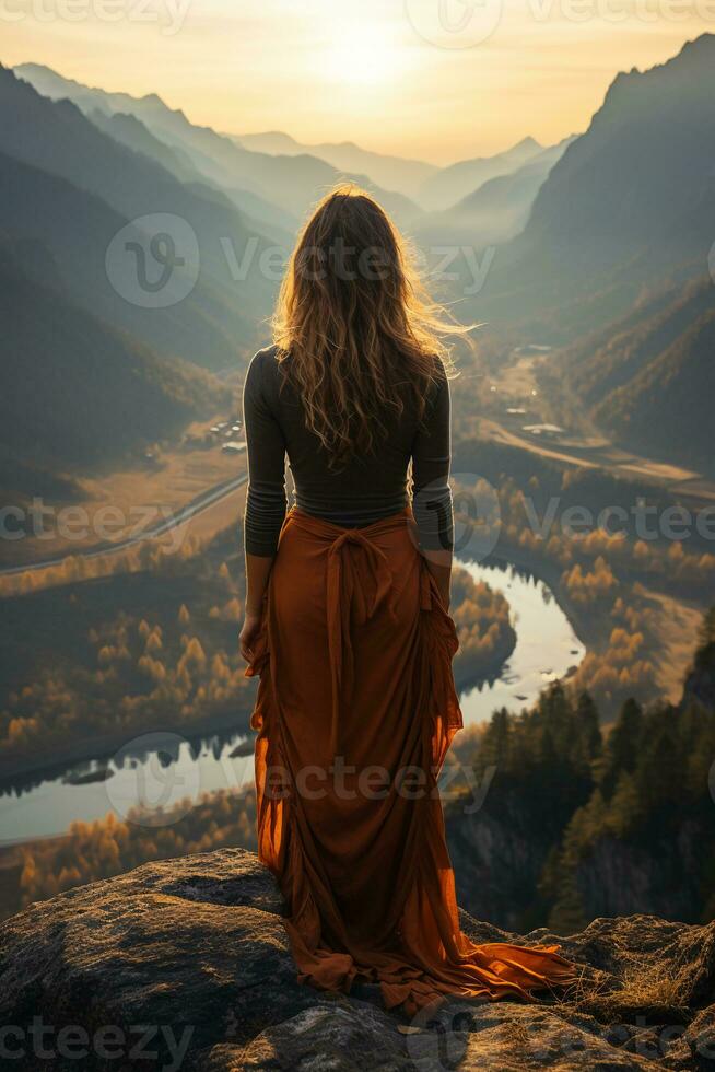 Pretty woman sitting on top of a mountain, viewed from behind. AI generative photo