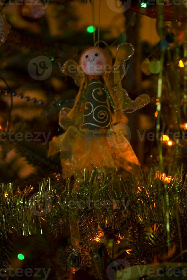 Christmasball on tree photo
