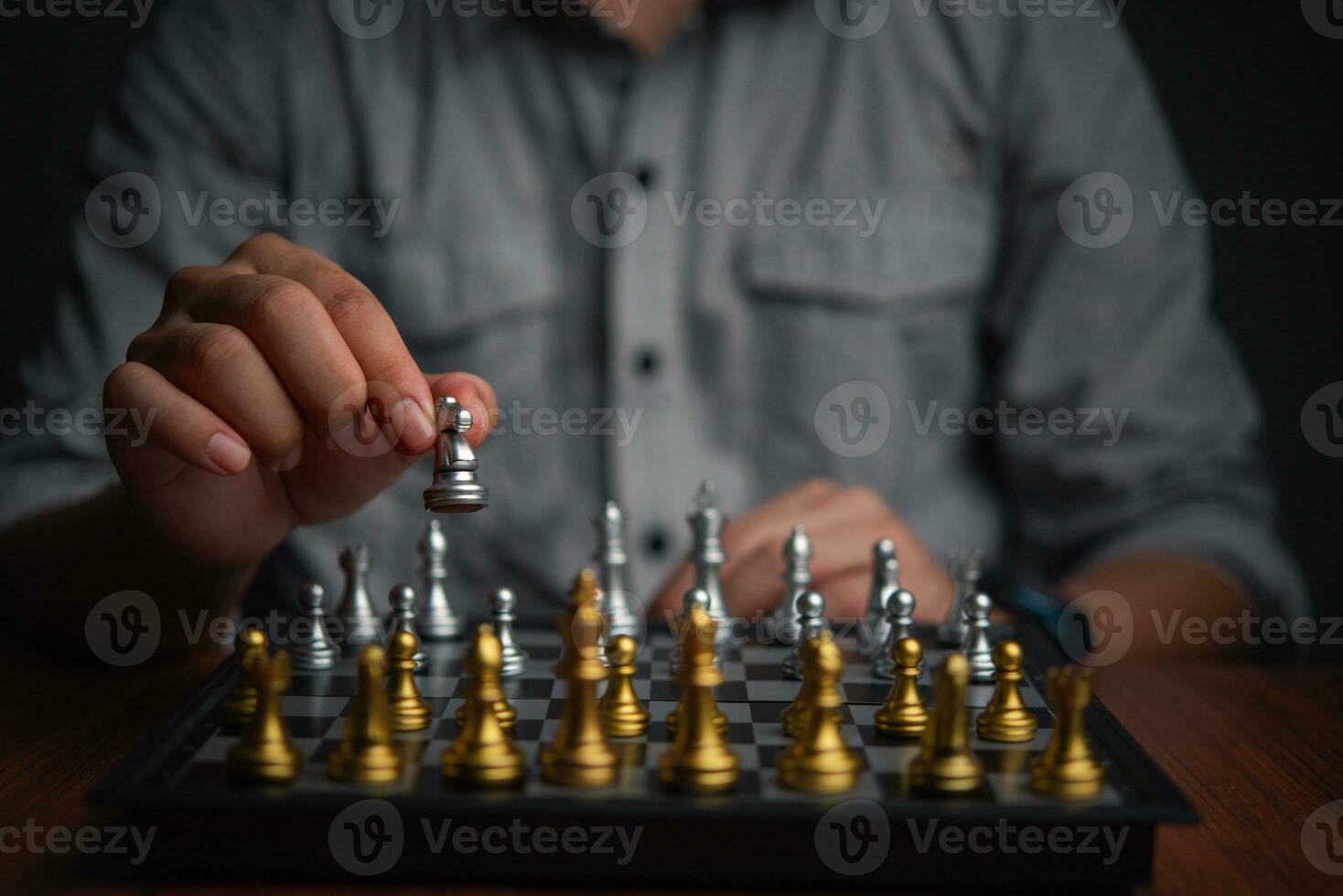 Success and plan in Business Strategy. Businessman in a Chess Game of Skill and Critical Thinking photo