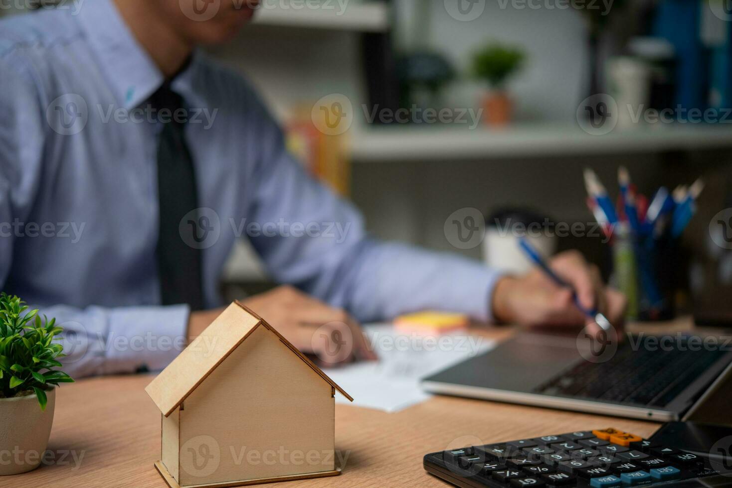 businessman working accountant document graph and chart on desk using calculator for calculate finance report in office. photo