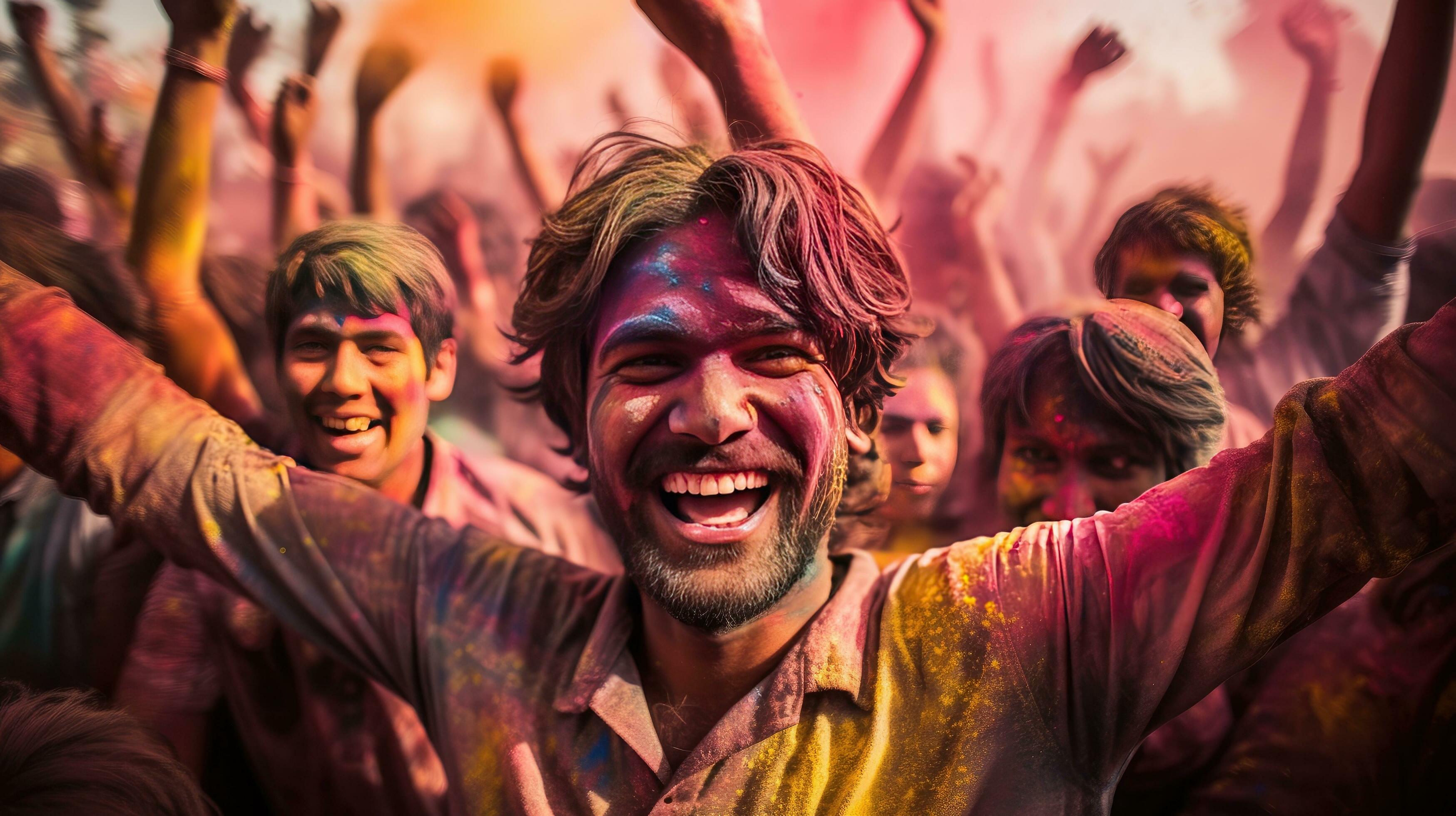 People celebrate colorful Holi festival in India, annual tourism colors