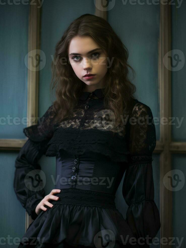 a young woman in a black gothic dress photo