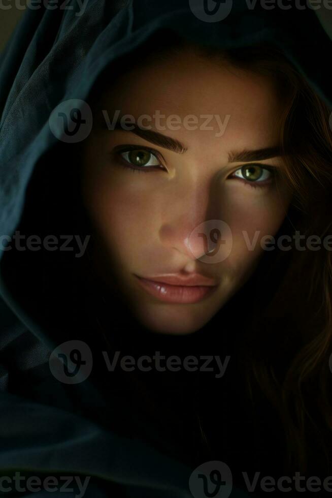 a woman in a hooded robe with green eyes generative ai photo