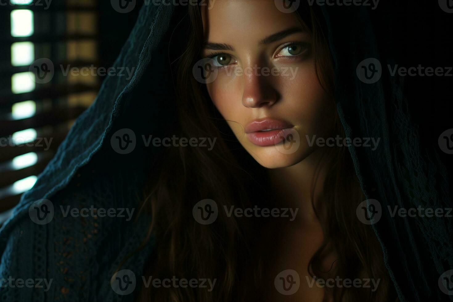 a beautiful woman in a hooded robe looking at the camera generative ai photo