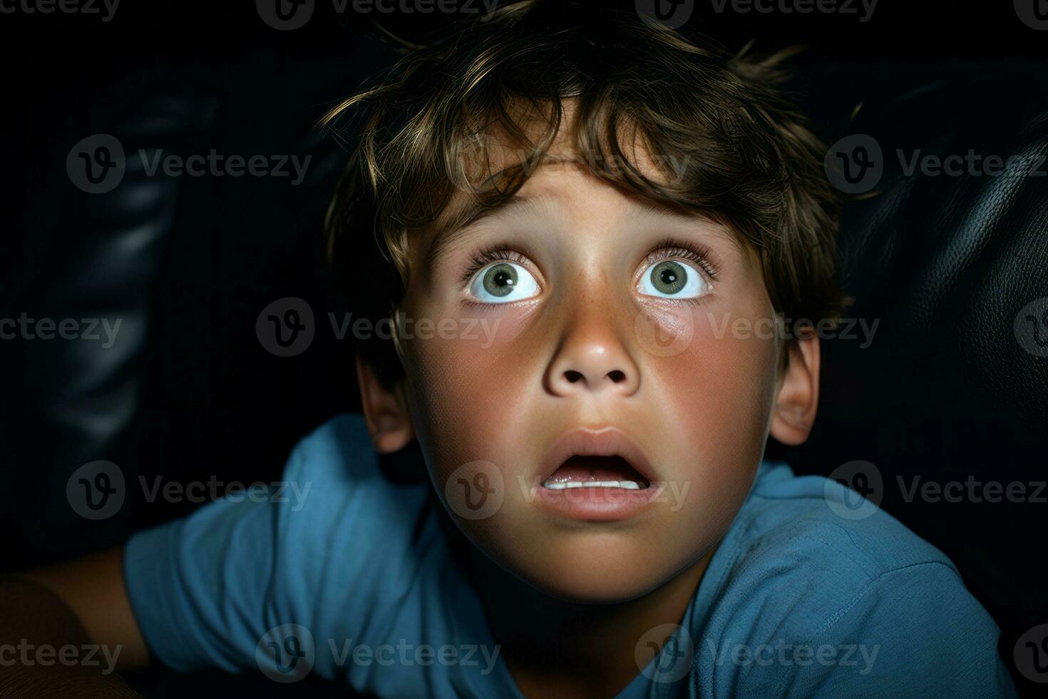 a young boy is looking up at the camera generative ai photo