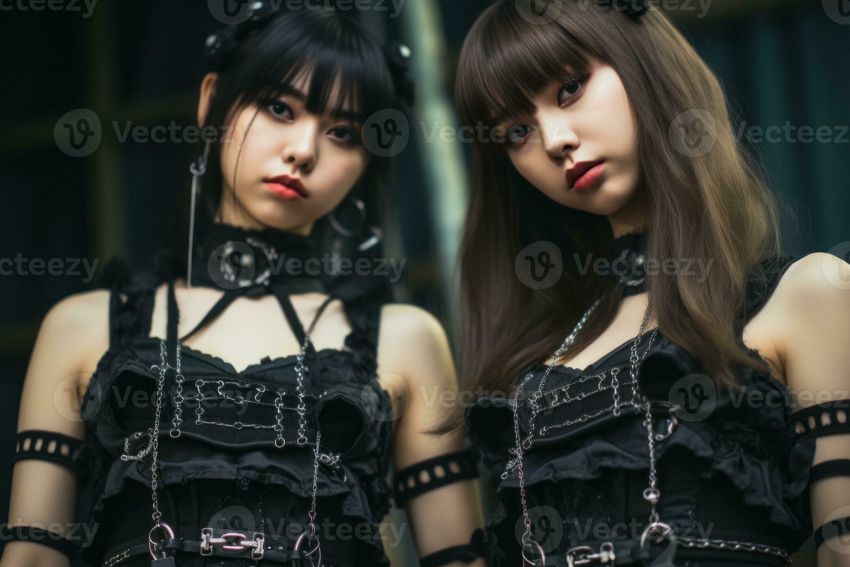 two asian women dressed in gothic clothing 29693025 Stock Photo at Vecteezy