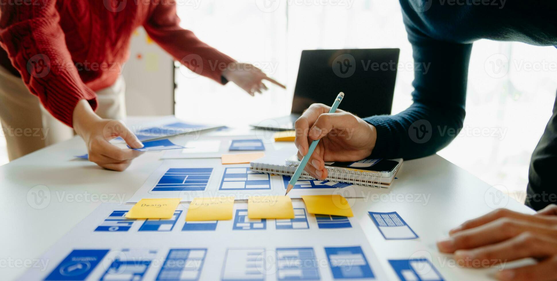 UX graphic designer planning application process development prototype wireframe for web smart phone. Creative digital development agency. photo