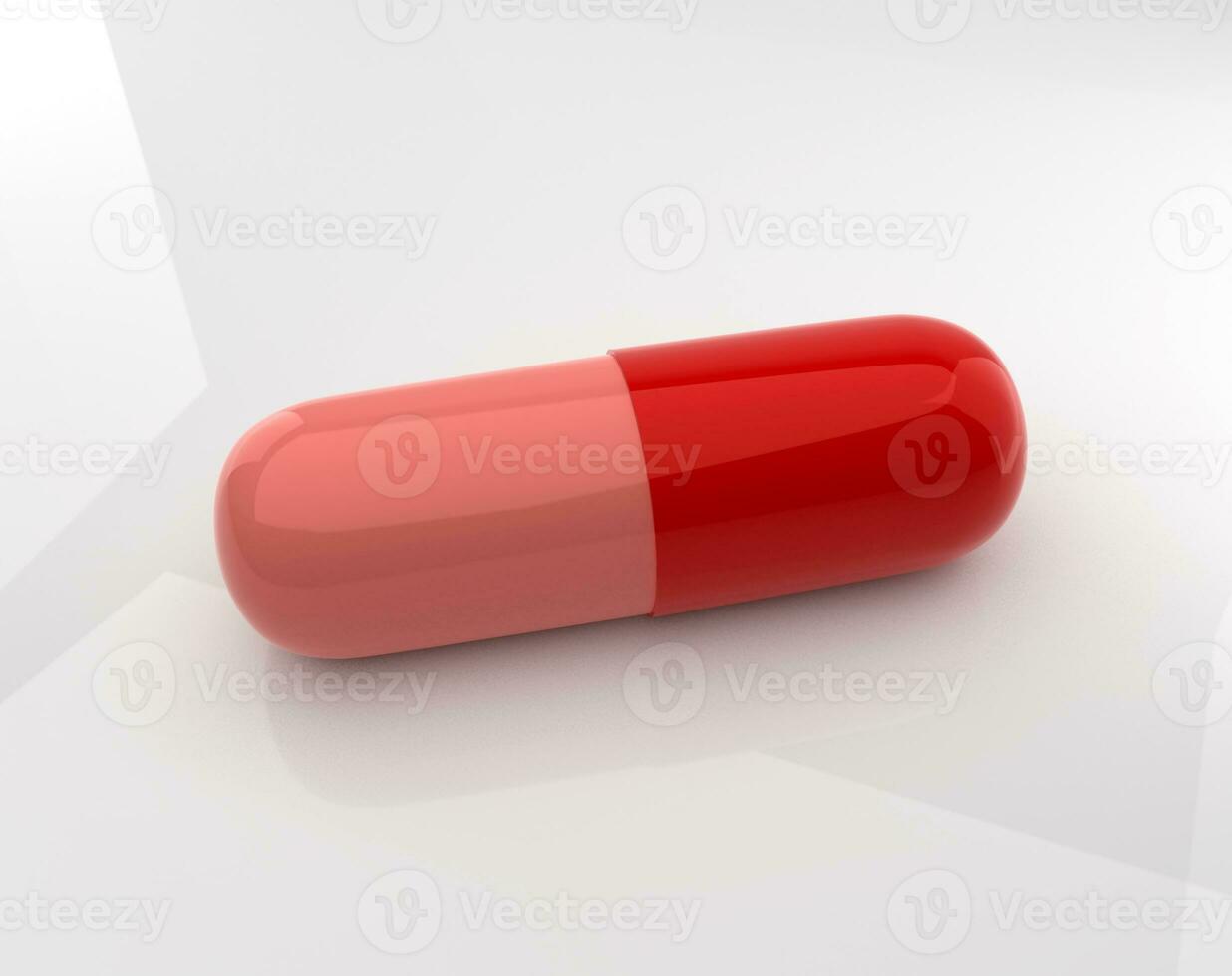 Medicine capsules with reflection on a white background photo