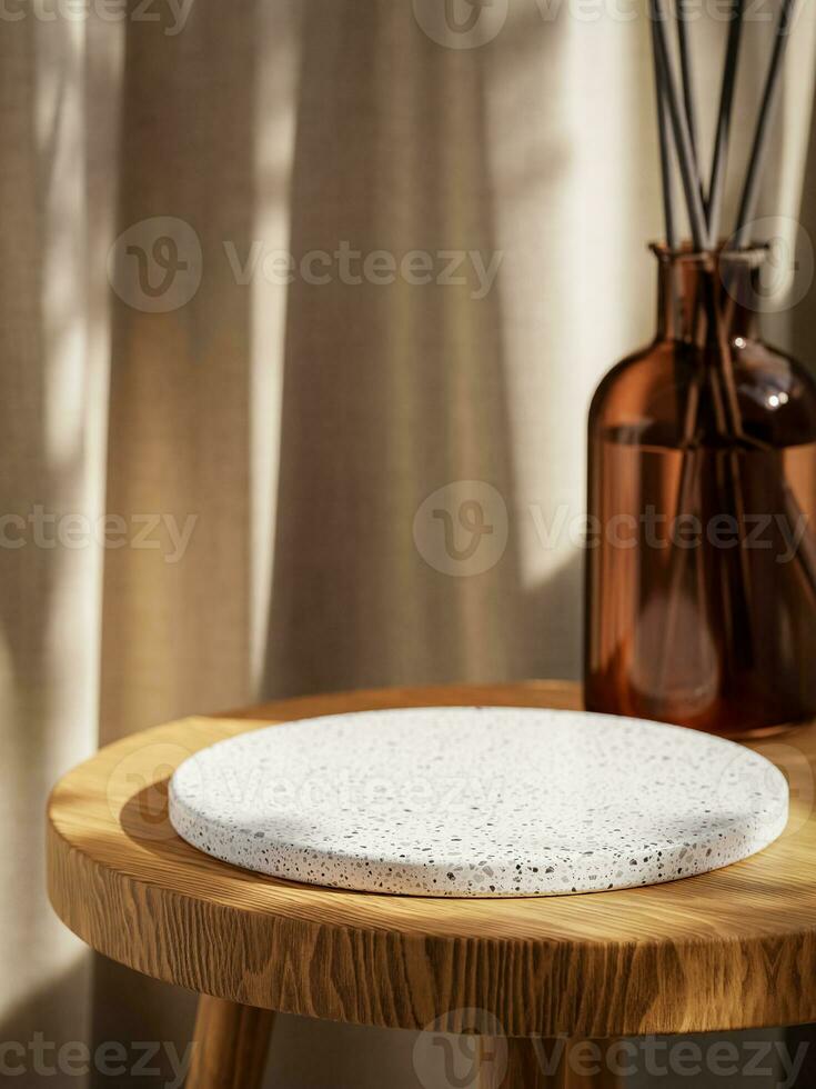 3d terrazzo display podium and diffuser on wooden chair against fabric background. 3d rendering of realistic presentation for product advertising. 3d illustration. photo