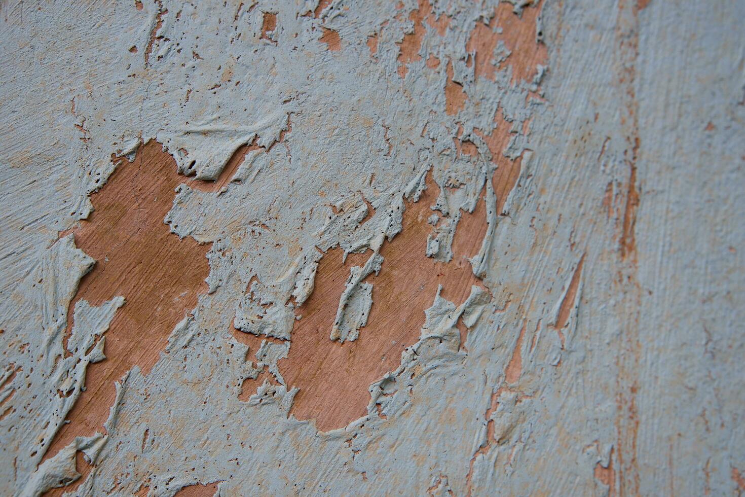 Background wall texture is damaged with the wall paint peeling off photo