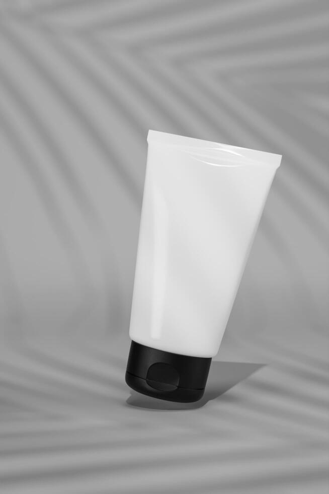 3d rendering A white tube of cosmetics green color background. The concept of natural cosmetics. Mockup. photo