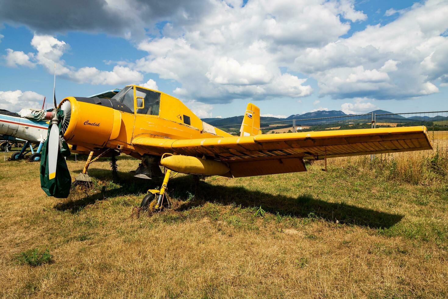 Stored classic small plane. Old timer general aircraft at museum. Aviation and travel. Aerospace industry. photo