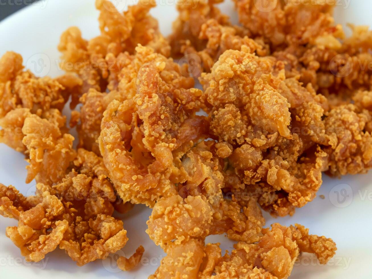 chicken fried with spicy chicken nuggets photo