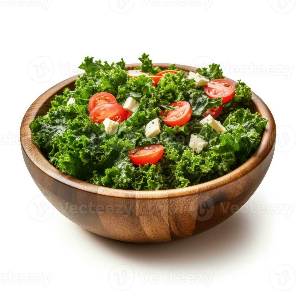 Chopped fresh kale salad in a wooden bowl isolated on a white background photo