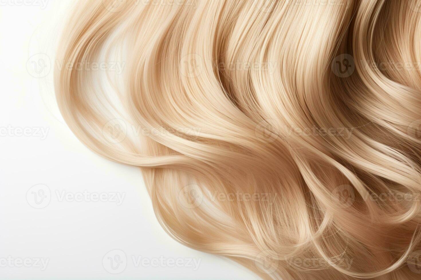 Blonde hair close-up. Women's long blond hair. Beautiful styling of wavy shiny curls. Hair coloring. Hairdressing treatments photo