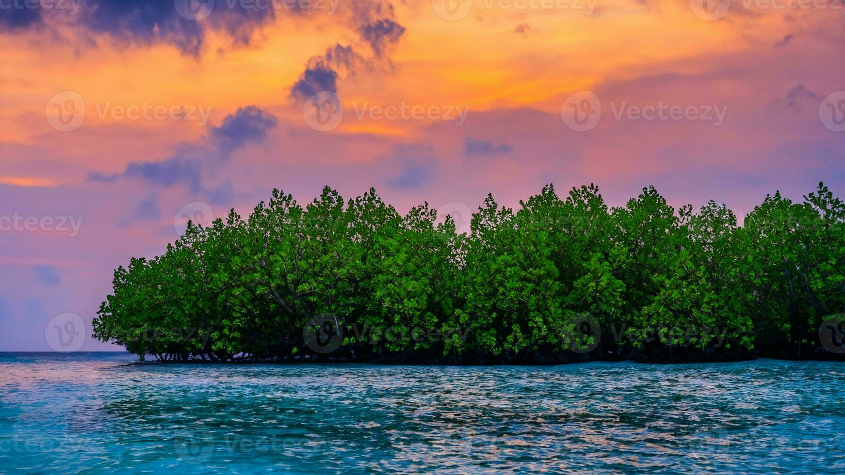 Trees silhouetted by the sunrise with a lighthouse in background. photo