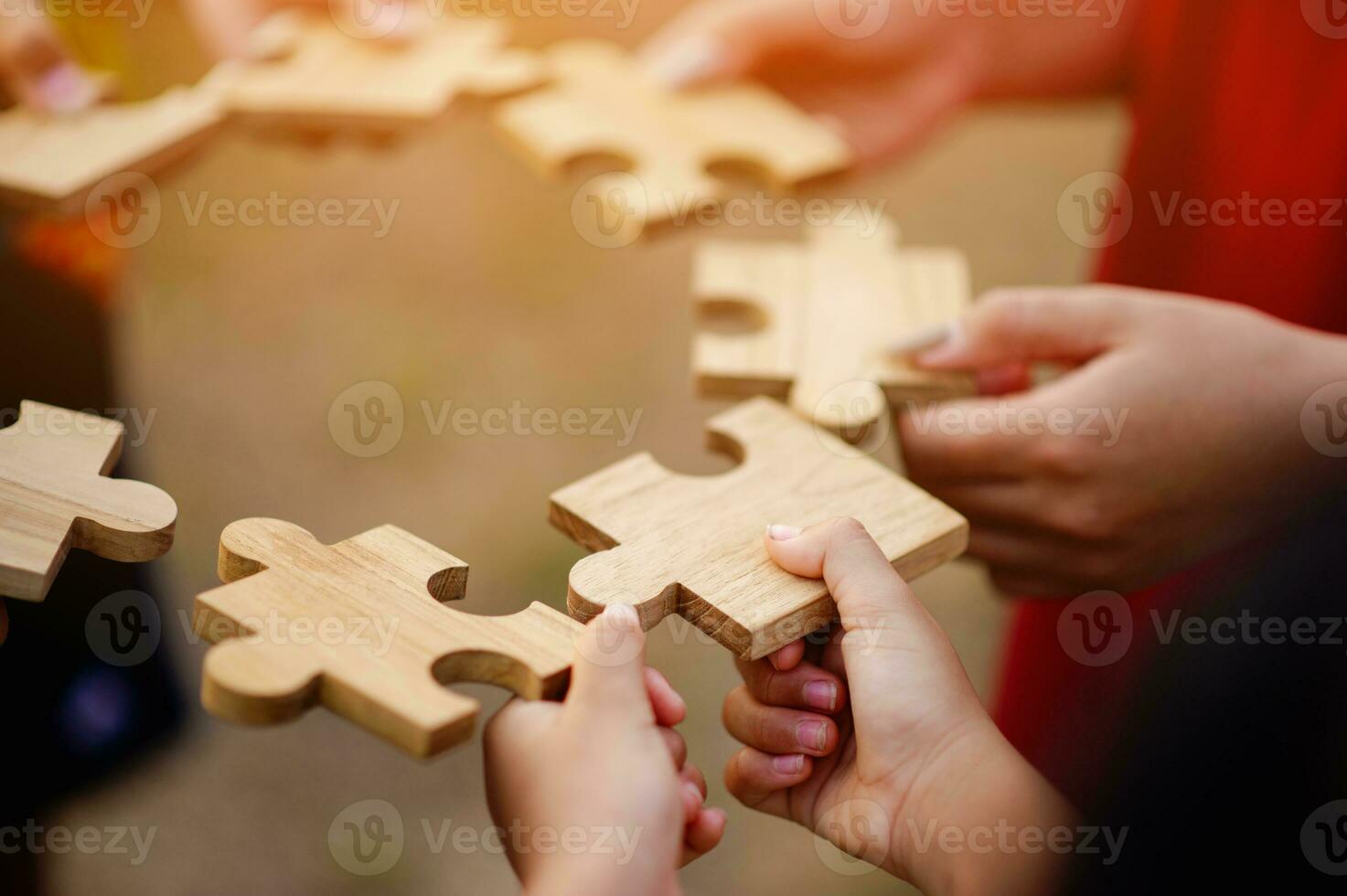 Jigsaw puzzle pieces group together, unite strength, unity, teamwork. communication connection teamwork concept photo