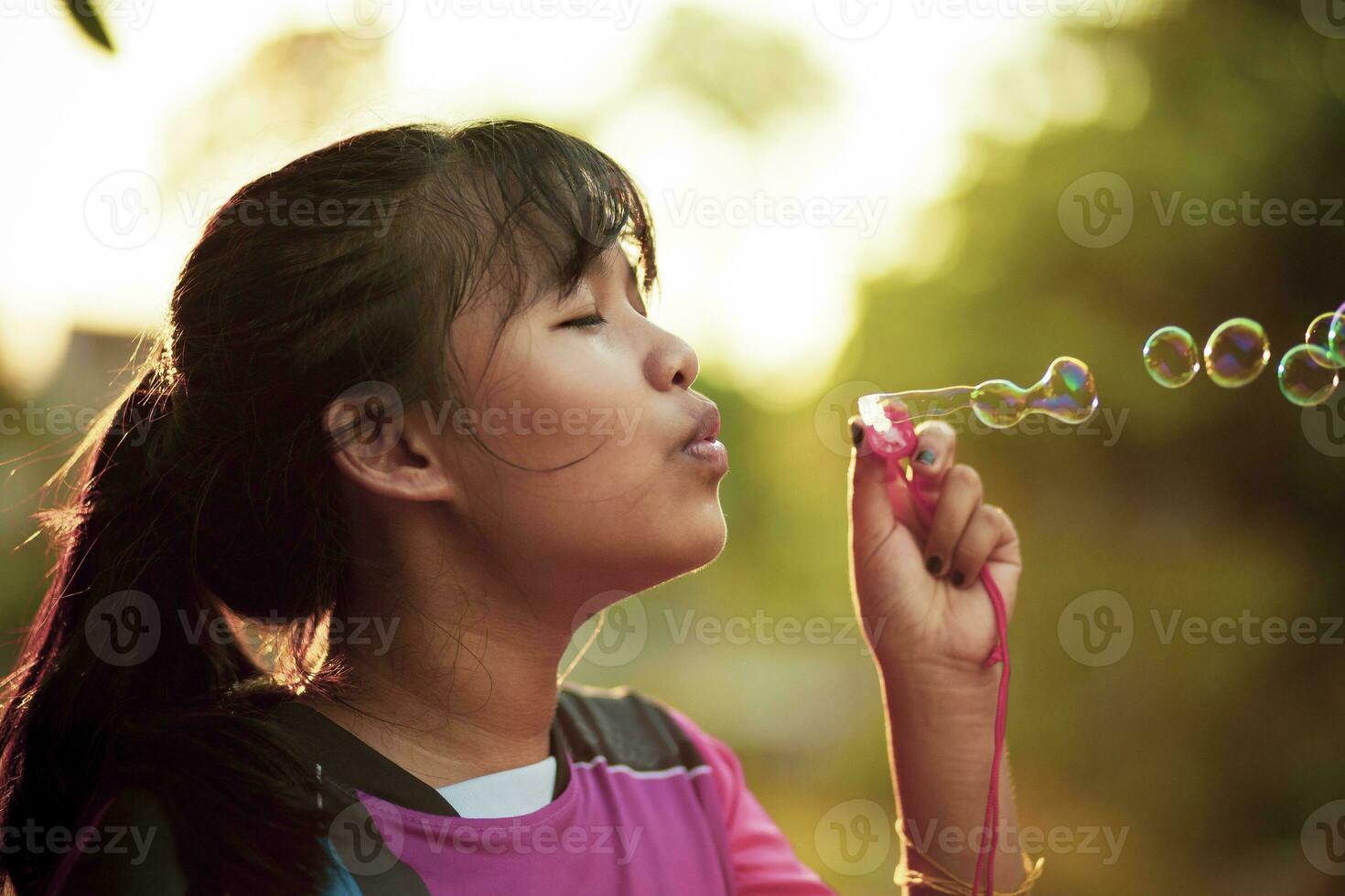 asian teenager relaxing with soup bubble photo