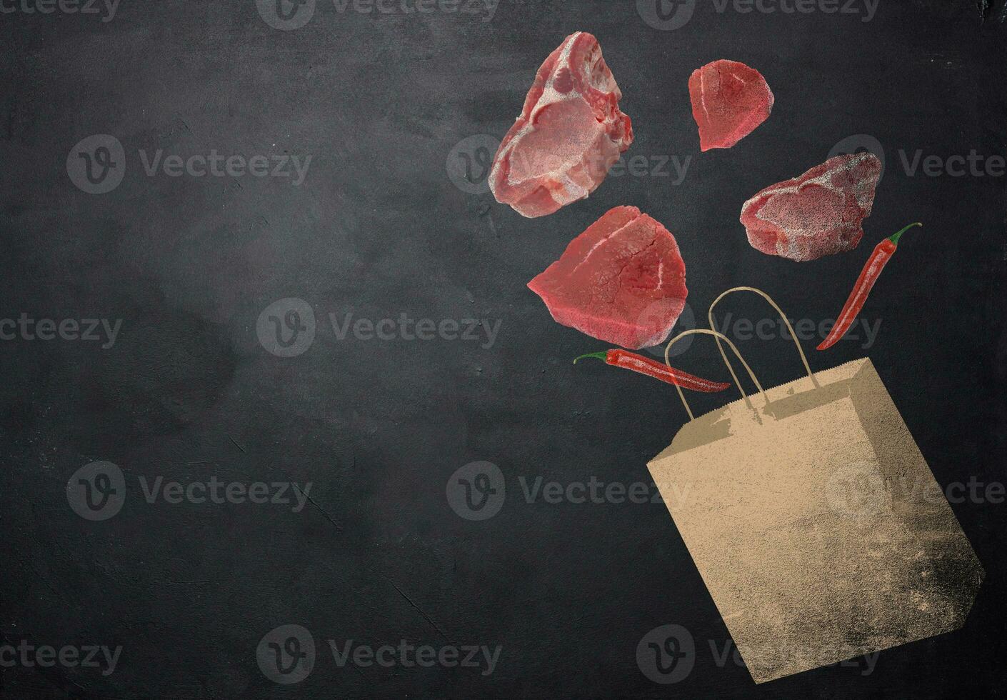 Drawn brown package and pieces of meat on a black chalk board. photo