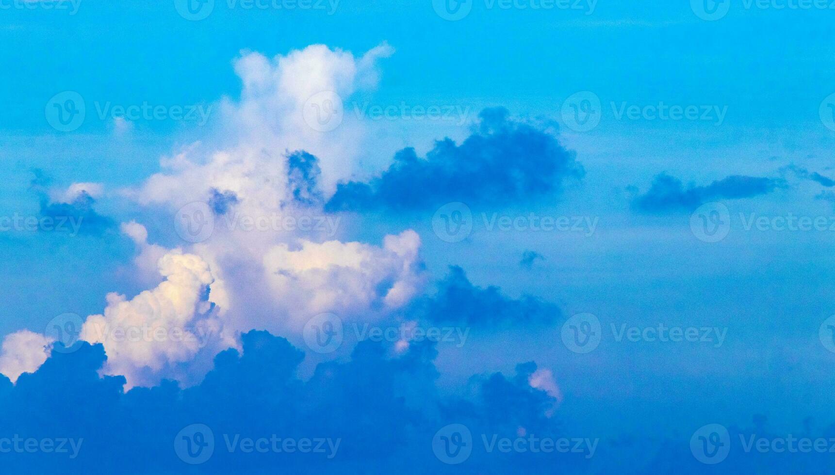 Explosive cloud formation cumulus clouds in the sky in Mexico. photo