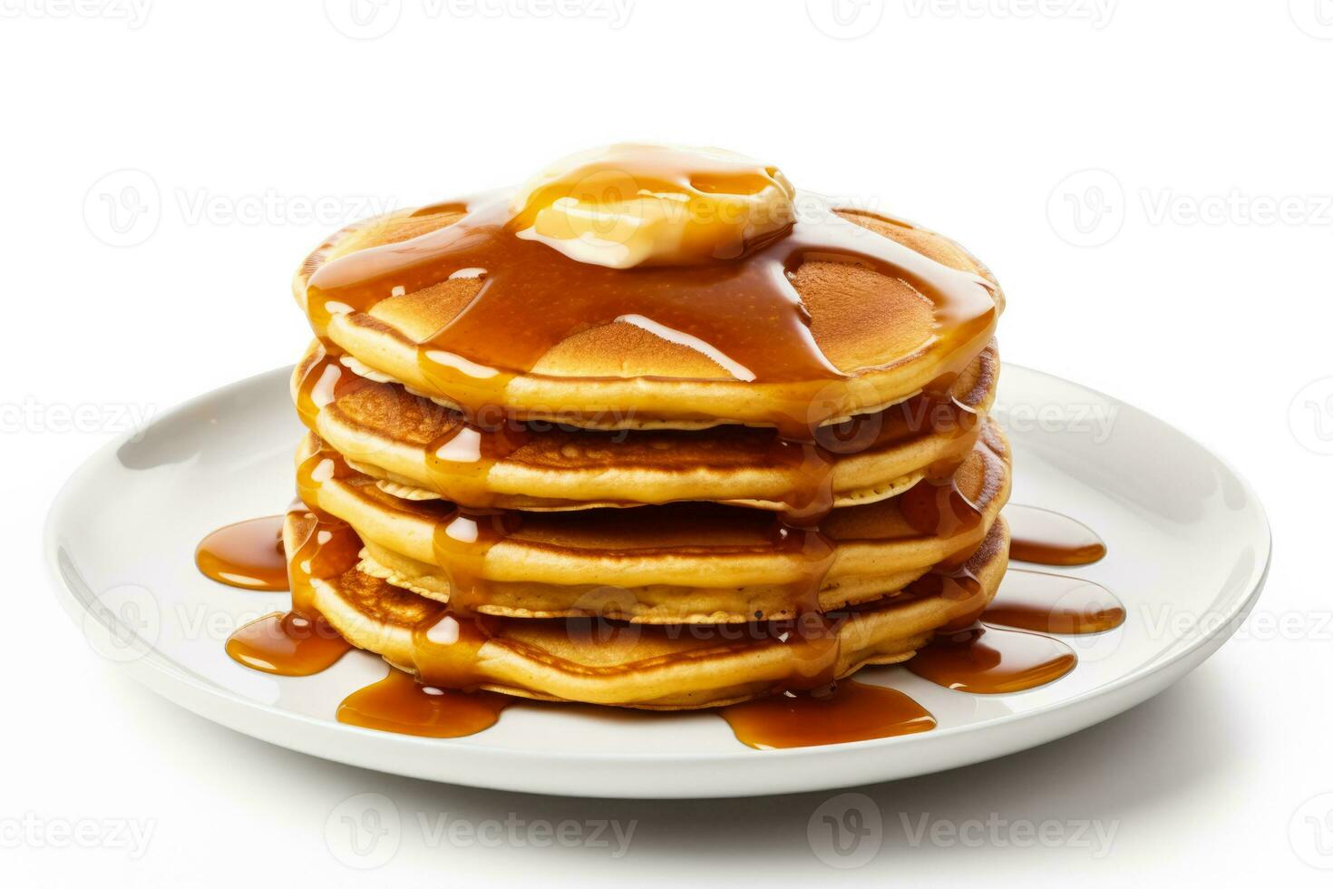 Stack of fluffy pumpkin pancakes with syrup drizzle isolated on a white background photo