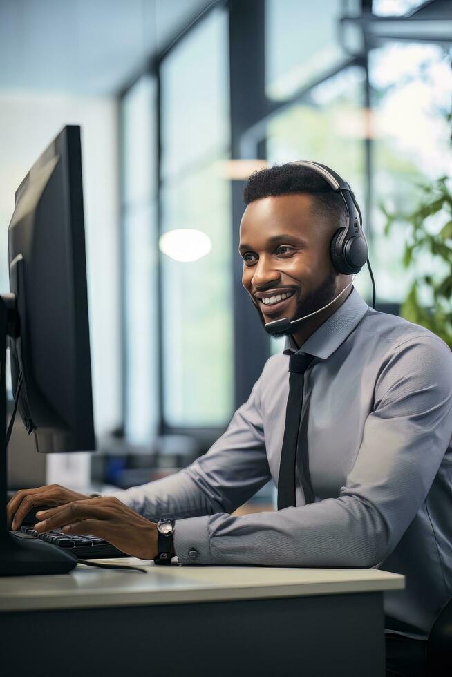Portrait of a Handsome African Man, Customer Service Operator, Call Center Worker Talking Through Headset with Customer in Modern Office. photo
